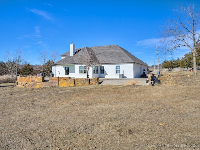 back of property featuring a patio