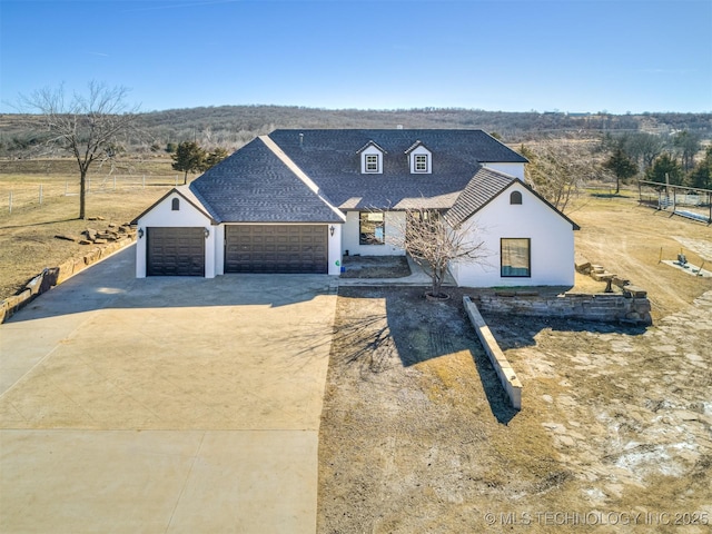 view of front of home featuring a garage