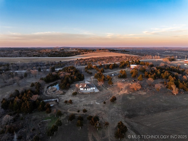 view of aerial view at dusk