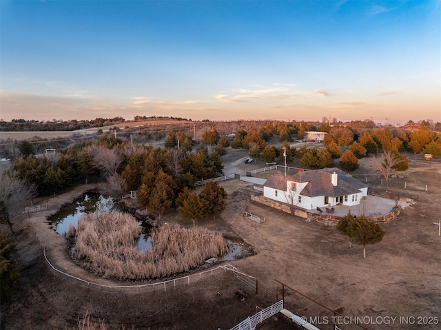 view of aerial view at dusk