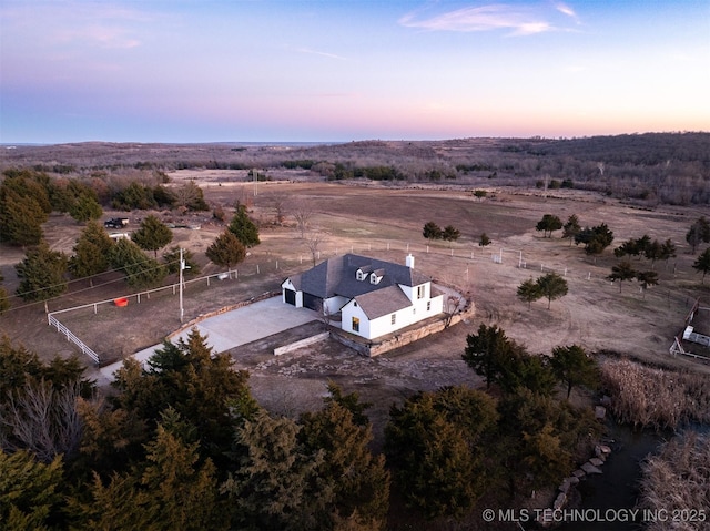 view of aerial view at dusk