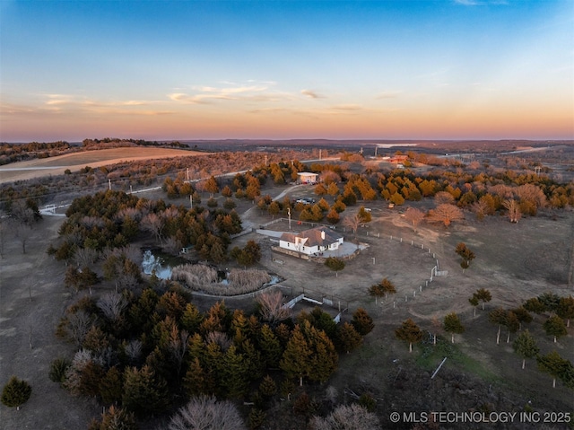 view of aerial view at dusk