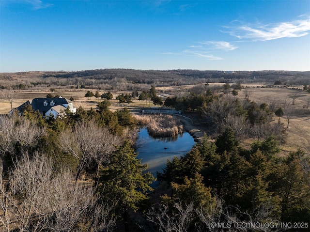 aerial view featuring a water view and a rural view