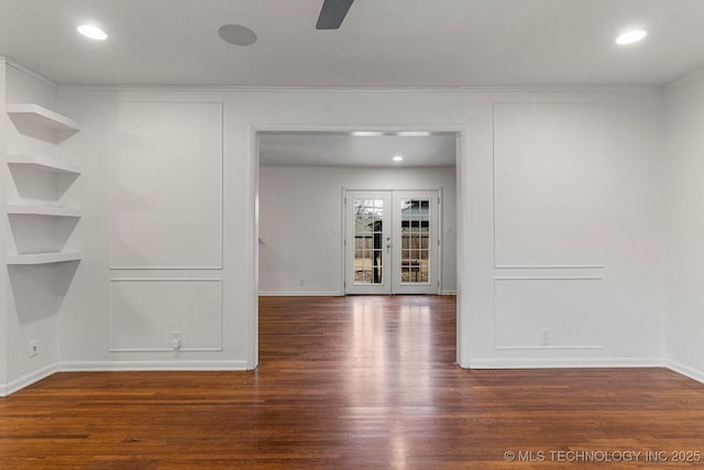 interior space featuring dark hardwood / wood-style flooring, built in features, and french doors