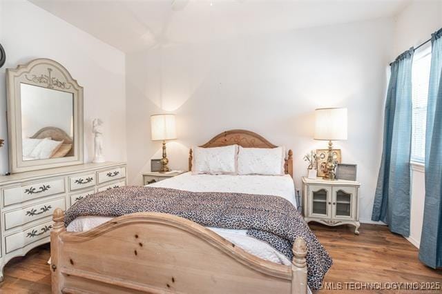 bedroom featuring hardwood / wood-style floors