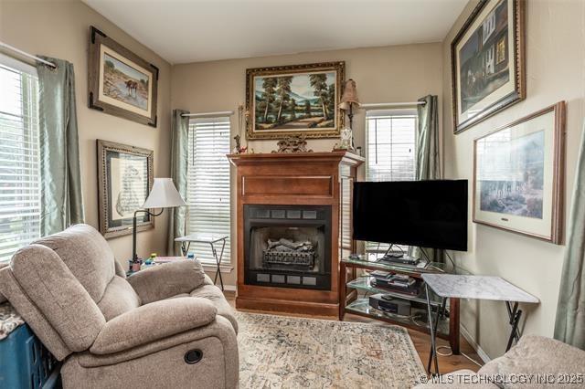 living area featuring hardwood / wood-style floors