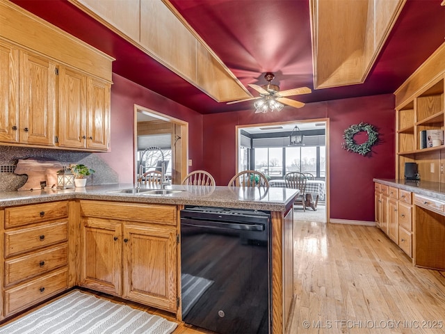 kitchen with light wood-style flooring, dishwasher, a peninsula, a ceiling fan, and backsplash