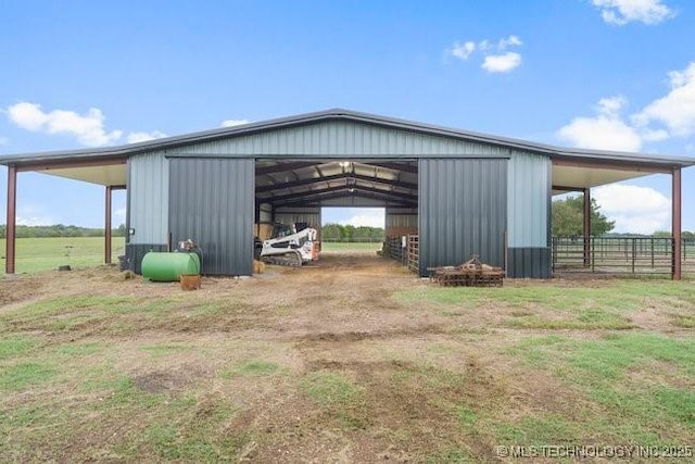 view of outbuilding with a rural view