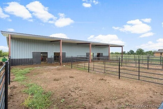 exterior space with a rural view