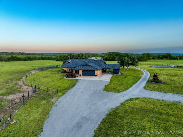 aerial view at dusk with a rural view
