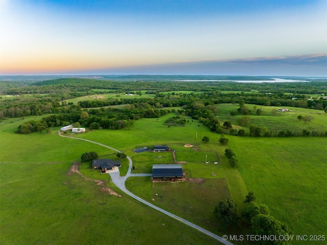 aerial view at dusk with a rural view