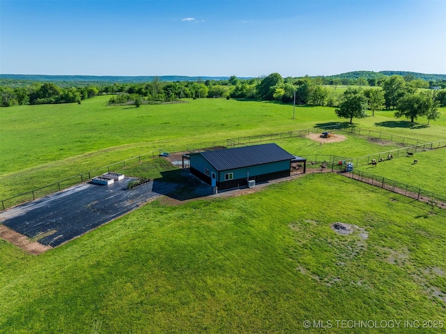 birds eye view of property featuring a rural view