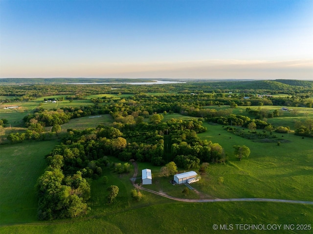 aerial view at dusk with a rural view