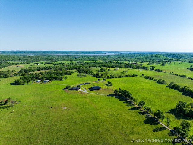 birds eye view of property featuring a rural view