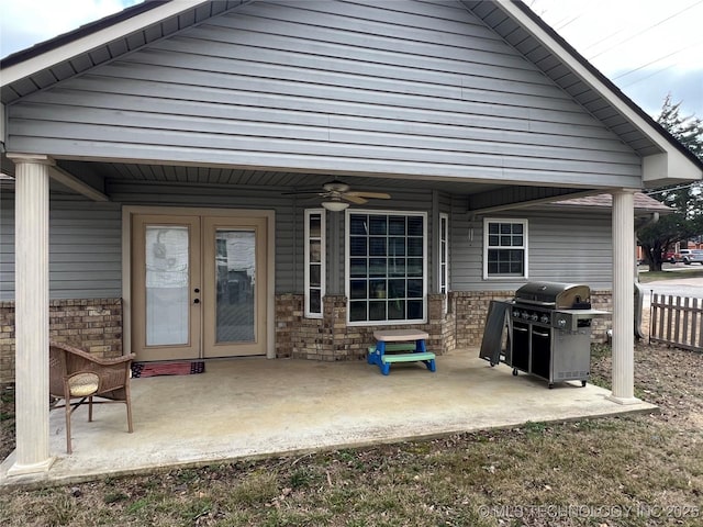 back of house with french doors, ceiling fan, and a patio