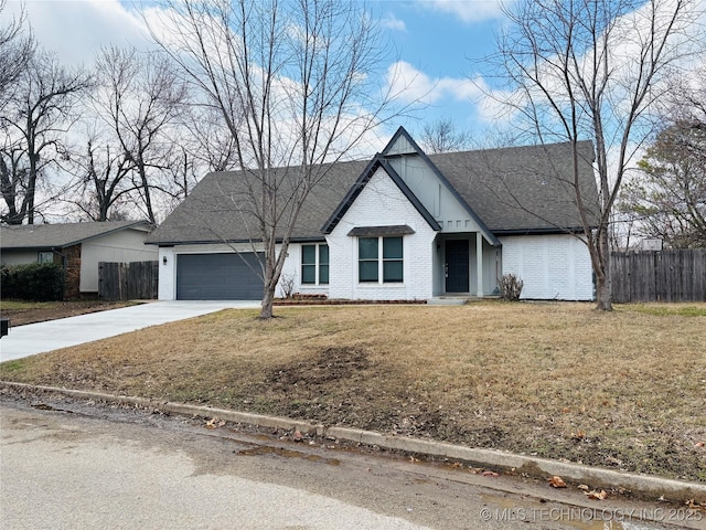 view of front facade featuring a garage and a front lawn