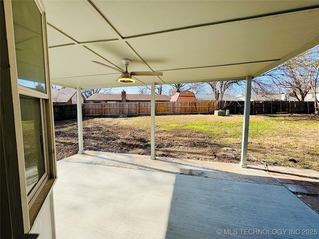 view of patio featuring ceiling fan