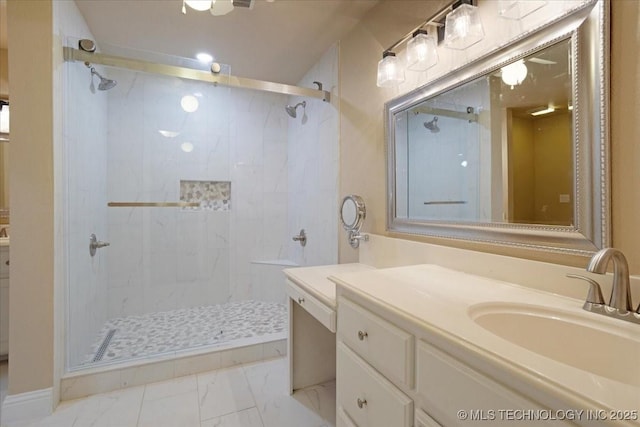 bathroom with vanity and walk in shower