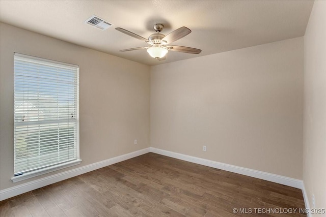 unfurnished room with wood-type flooring and ceiling fan