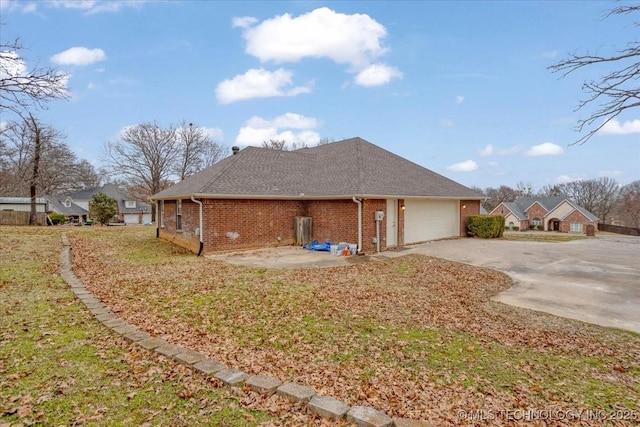 view of home's exterior with a garage