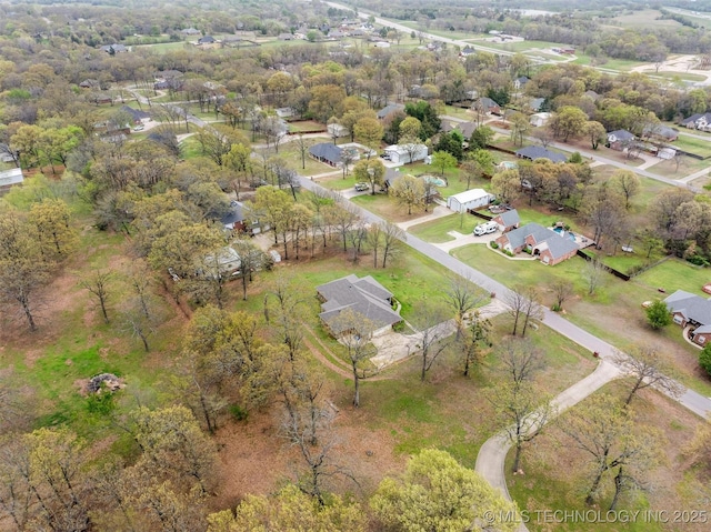birds eye view of property with a residential view