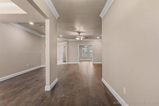 interior space with baseboards, ornamental molding, ceiling fan, recessed lighting, and dark wood-style floors