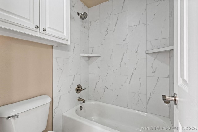 bathroom featuring shower / tub combination and toilet
