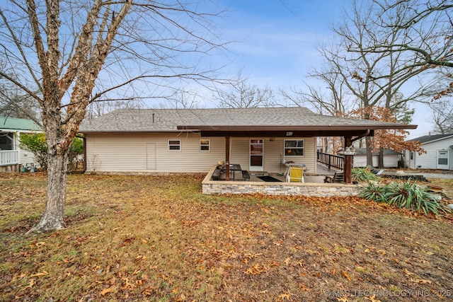 rear view of house with a patio