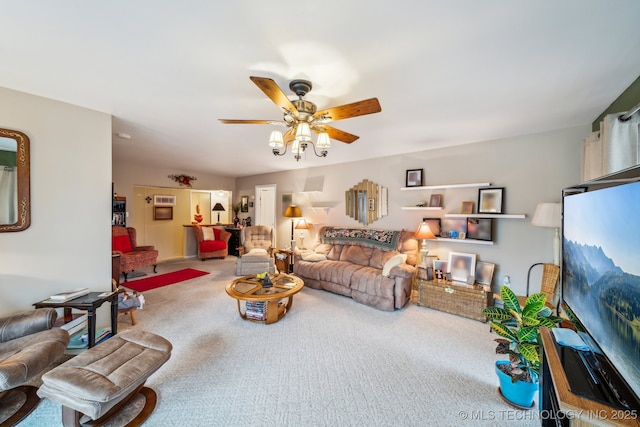 carpeted living room featuring ceiling fan