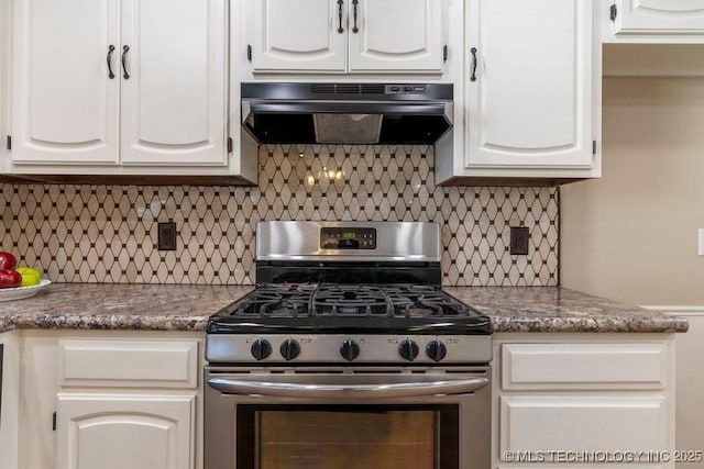 kitchen with backsplash, range hood, stainless steel range with gas stovetop, and white cabinets