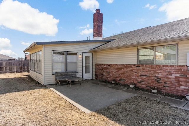 back of property with a patio area