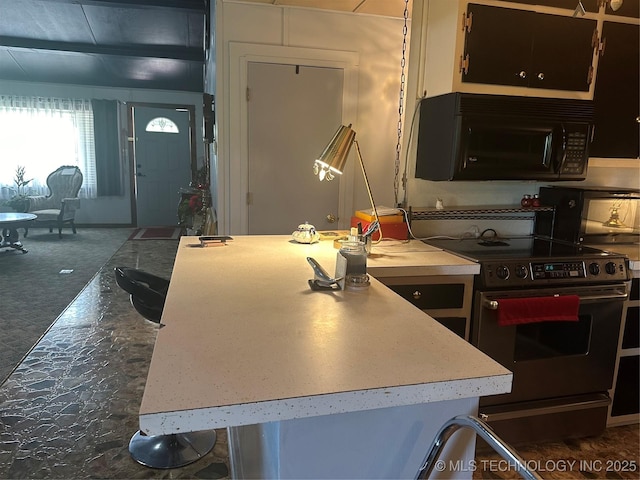 kitchen featuring stainless steel range with electric cooktop