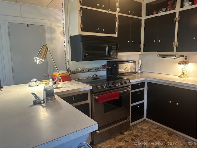 kitchen featuring stainless steel electric range