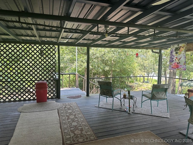 wooden deck featuring a pergola