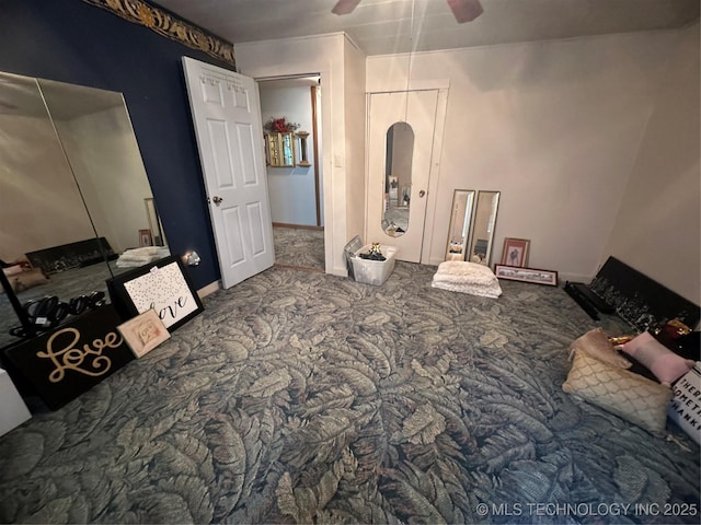 carpeted bedroom featuring ceiling fan