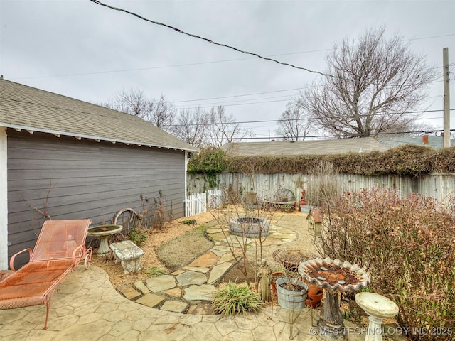 view of patio / terrace featuring a fire pit