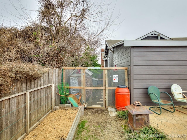 view of jungle gym with an outbuilding