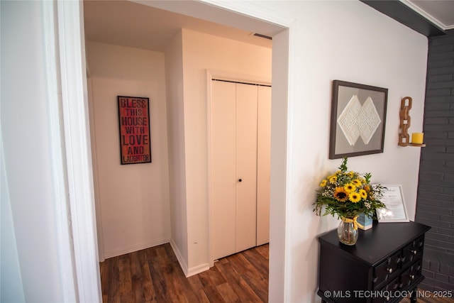 corridor featuring dark wood-type flooring