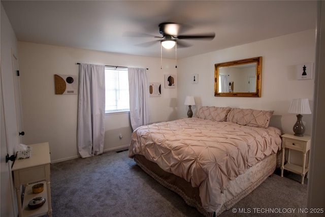 carpeted bedroom featuring ceiling fan