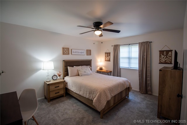 bedroom featuring dark colored carpet and ceiling fan