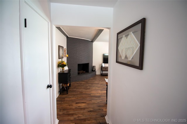 hallway featuring dark hardwood / wood-style flooring