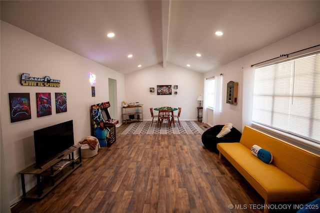 interior space featuring dark hardwood / wood-style flooring and lofted ceiling with beams