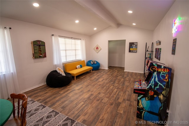 recreation room featuring vaulted ceiling with beams and dark hardwood / wood-style floors