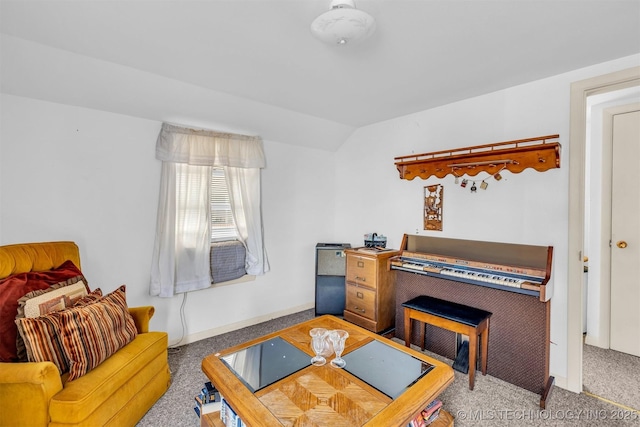 dining area featuring lofted ceiling