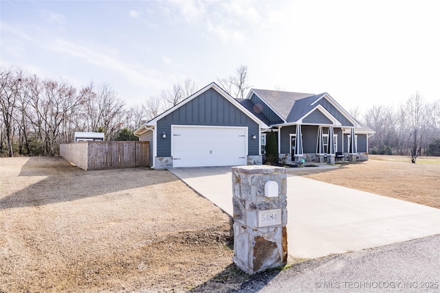 view of front of property featuring a garage and a porch