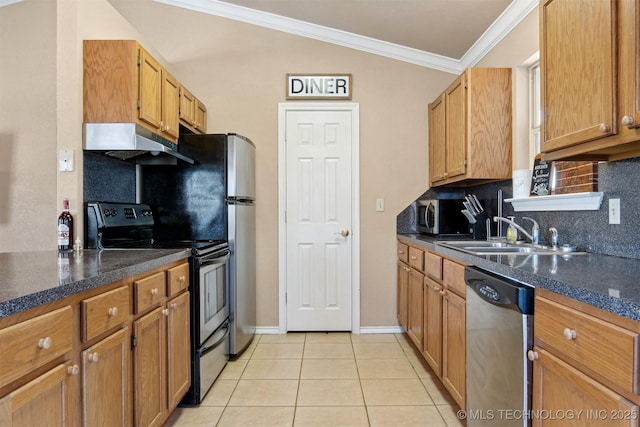 kitchen with appliances with stainless steel finishes, tasteful backsplash, sink, light tile patterned floors, and crown molding