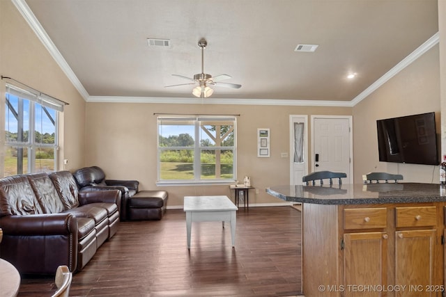 living room featuring crown molding, dark wood-type flooring, and ceiling fan