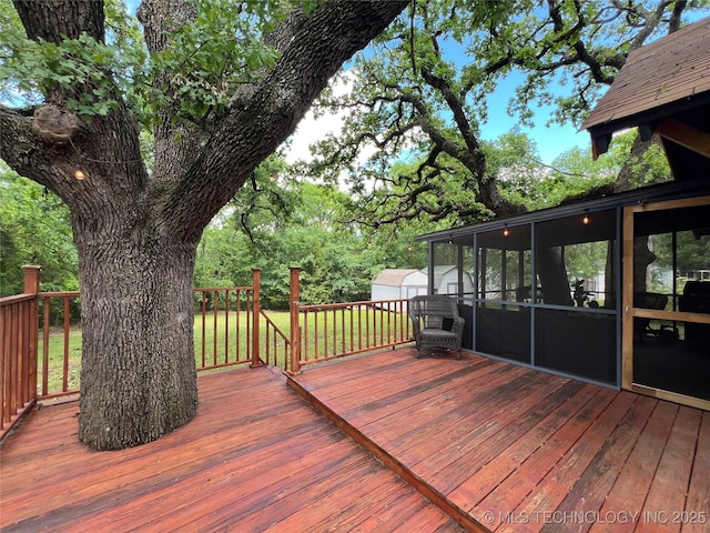 4 Canadian Dr, Burneyville, OK 73430 - wooden deck with a sunroom