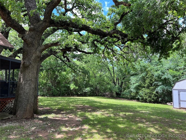 4 Canadian Dr, Burneyville, OK 73430 - view of grassy yard with a sunroom