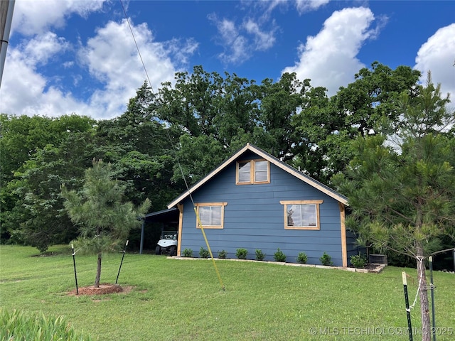 4 Canadian Dr, Burneyville, OK 73430 - view of property exterior featuring a yard